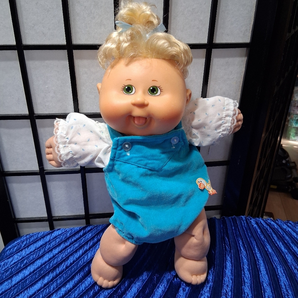 Charming Doll in Turquoise Outfit
